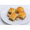 traditional dessert turkish baklava,well known in middle east and delicious isolated on white background