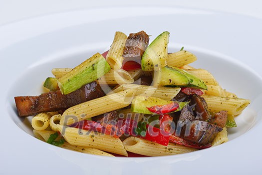 Pasta with shrimps, herbs and mashrooms isolated on white background in studio Pasta with shrimps, herbs and mashrooms isolated on white background in studio