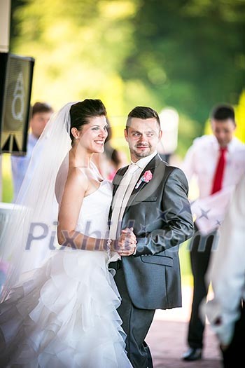 Portrait of a young wedding couple on their wedding day Portrait of a young wedding couple on their wedding day