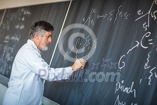 Senior chemistry professor writing on the board while having a chalk and blackboard lecture (shallow DOF; color toned image) Senior chemistry professor writing on the board while having a chalk and blackboard lecture (shallow DOF; color toned image)