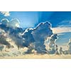 Clouds in sky with sunrays on sunrise