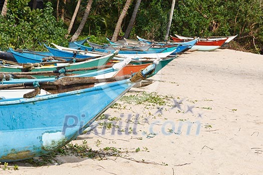 Fishing boats on beach. Mirissa, Sri Lanka