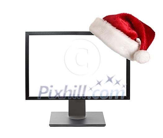 Cristmas online shopping concept - Computer monitor with Santa hat isolated on white background Cristmas online shopping concept - Computer monitor with Santa hat isolated on white background