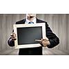 Close up of businessman holding blank frame. Place for text