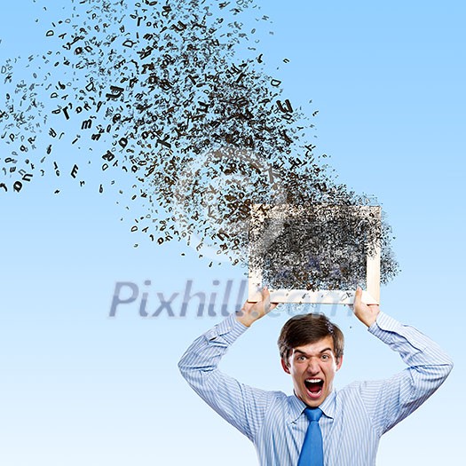 Anxious businessman holding frame with letter flying out