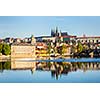 View of Mala Strana and Prague castle and St. Vitus Cathedral over Vltava river in the morning. Prague, Czech Republic