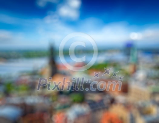Blurred backgroun of European city - aerial view of Riga center from St. Peter's Church, Riga, Latvia Blurred backgroun of European city - aerial view of Riga center from St. Peter's Church, Riga, Latvia