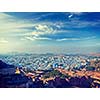 Vintage retro effect filtered hipster style panorama image of Jodhpur, known as Blue City due to blue-painted Brahmin houses. View from Mehrangarh Fort. Rajasthan, India