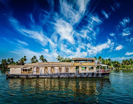 Kerala India travel background - houseboat on Kerala backwaters. Kerala, India