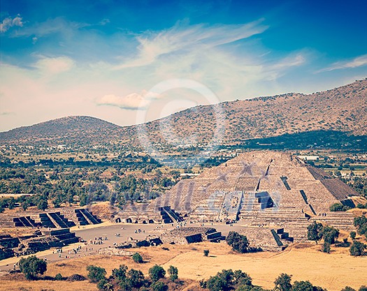 Vintage retro effect filtered hipster style image of famous Mexico landmark tourist attraction - Pyramid of the Moon, view from the Pyramid of the Sun. Teotihuacan, Mexico Vintage retro effect filtered hipster style image of famous Mexico landmark tourist attraction - Pyramid of the Moon, view from the Pyramid of the Sun. Teotihuacan, Mexico