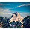 Vintage retro effect filtered hipster style image of ancient mayan pyramid Pyramid of the Magician in Uxmal, Merida, Yucatan, Mexico
