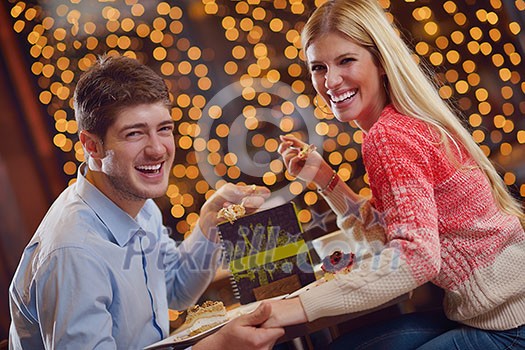 romantic evening date in restaurant happy young couple with wine glass tea and cake romantic evening date in restaurant happy young couple with wine glass tea and cake