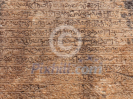 Ancient stone inscriptions in Singalese language texture. Pollonaruwa, Sri Lanka Ancient stone inscriptions in Singalese language texture. Pollonaruwa, Sri Lanka
