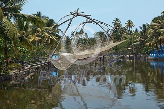 Traditional Chinese fishnets at Kerala backwaters. Kerala, India