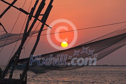 Kochi chinese fishnets on sunset. Fort Kochin, Kochi, Kerala, India Kochi chinese fishnets on sunset. Fort Kochin, Kochi, Kerala, India