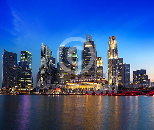 Singapore skyline and river in evening