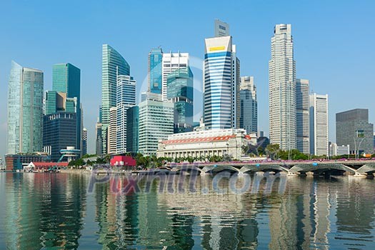 Singapore business district skyscrapers and Marina Bay in day Singapore business district skyscrapers and Marina Bay in day