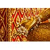 Buddha statue hand with flowers. Wat Phra That Doi Suthep, Chiang Mai, Thailand