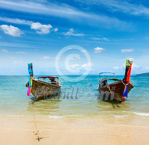 Long tail boat on tropical beach Railay beach), Krabi, Thailand Long tail boat on tropical beach Railay beach), Krabi, Thailand