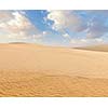 White sand dunes on sunrise in desert, Mui Ne, Vietnam