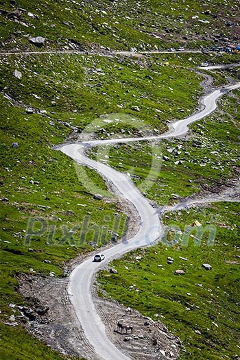 Serpentine road in Himalayas mountains. Himachal Pradesh, India Serpentine road in Himalayas mountains. Himachal Pradesh, India
