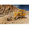 Bulldozer doing road construction in Himalayas. Ladakh, Jammu and Kashmir, India