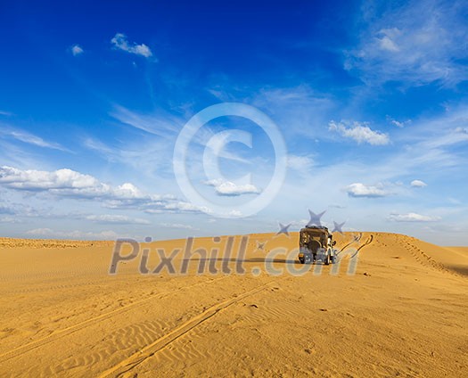 Desert safari - awd car in dunes. Thar desert, Rajasthan, India Desert safari - awd car in dunes. Thar desert, Rajasthan, India