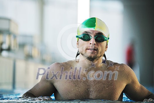 health and fitness lifestyle concept with young athlete swimmer recreating on olimpic pool health and fitness lifestyle concept with young athlete swimmer recreating on olimpic pool