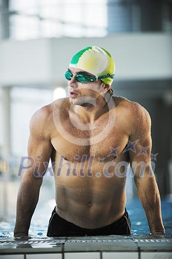health and fitness lifestyle concept with young athlete swimmer recreating on olimpic pool health and fitness lifestyle concept with young athlete swimmer recreating on olimpic pool