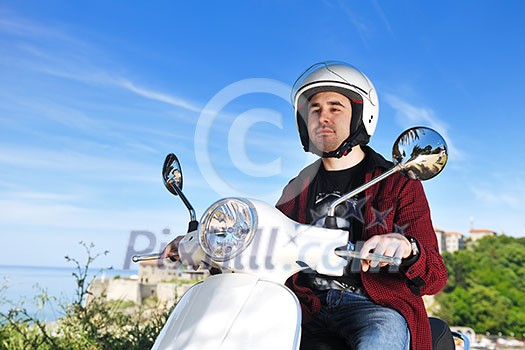 young man ride white retro vintage motorbike scooter young man ride white retro vintage motorbike scooter