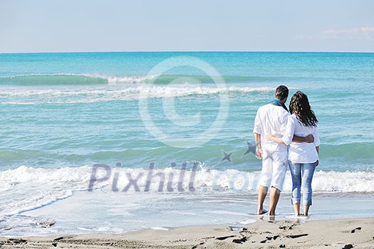 happy young couple in white clothing  have romantic recreation and   fun at beautiful beach on  vacations