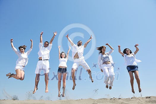 happy people group have fun run and jump on beach beautiful sand beach happy people group have fun run and jump on beach beautiful sand beach