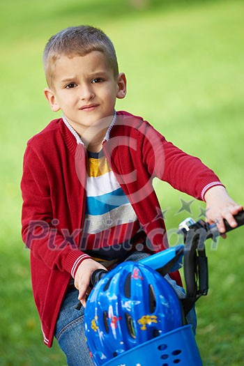 Young boy on the bicycle at Park