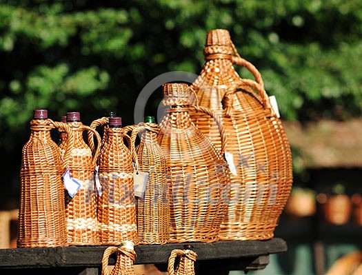 cane furniture and bottle with wood decoration outdoor in nature