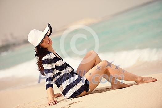 beautifel and happy woman girl on beach have fun and relax on summer vacation over the beautiful tropical sea beautifel and happy woman girl on beach have fun and relax on summer vacation over the beautiful tropical sea