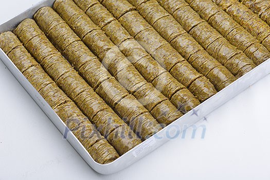 traditional dessert turkish baklava,well known in middle east and delicious isolated on white background