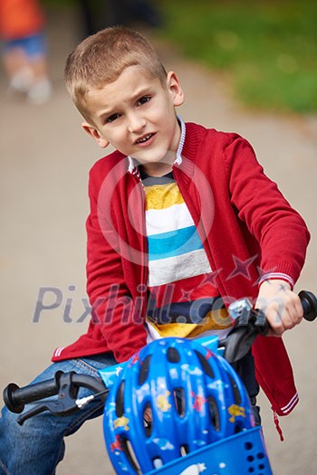 Young boy on the bicycle at Park