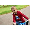 Young boy on the bicycle at Park