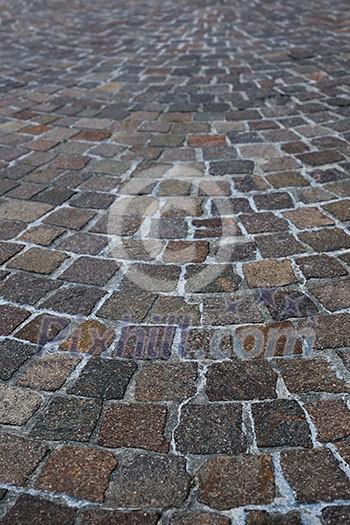 Floor of a street with stone tiles Floor of a street with stone tiles