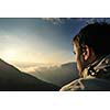 healthy young man practice yoga in height mountain at early morning and sunrise