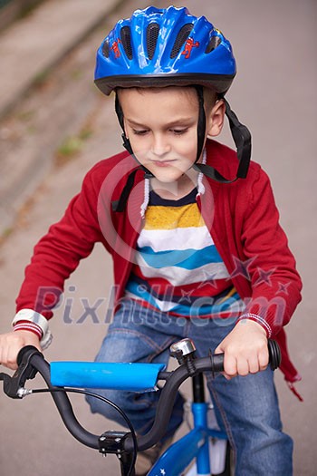 Young boy on the bicycle at Park