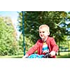 Young boy on the bicycle at Park