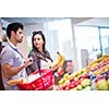 Young couple shopping in a supermarket