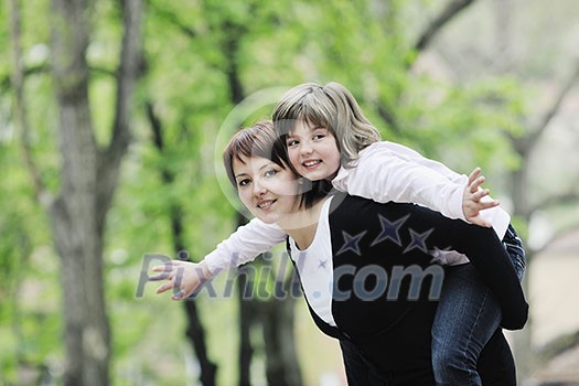 happy oung mother and daughter have fun outdoor happy oung mother and daughter have fun outdoor
