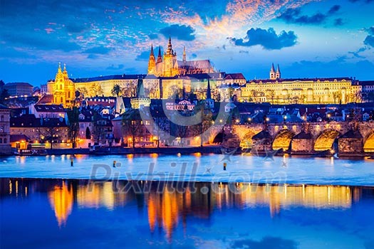 Travel Prague Europe background - view of Prague Castle and St. Vitus cathedral in twilight with dramatic sky. Prague, Czech Republic