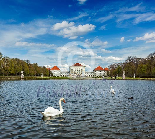 Swan in fountain in Grand Parterre (Baroque garden) and the rear view of the Nymphenburg Palace. Munich, Bavaria, Germany Swan in fountain in Grand Parterre (Baroque garden) and the rear view of the Nymphenburg Palace. Munich, Bavaria, Germany