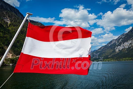 Austrian flag agains mountain lake and Austria alps background Austrian flag agains mountain lake and Austria alps background