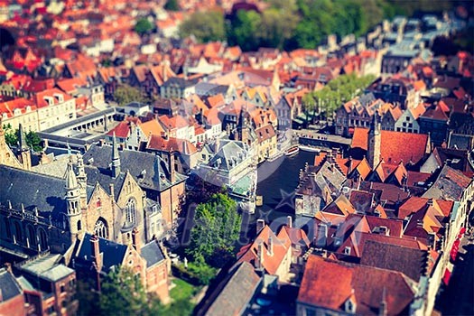 Aerial view of Bruges (Brugge) from Belfry, Belgium. Tilf shift effect. Cross processed vintage retro style. Aerial view of Bruges (Brugge) from Belfry, Belgium. Tilf shift effect. Cross processed vintage retro style.