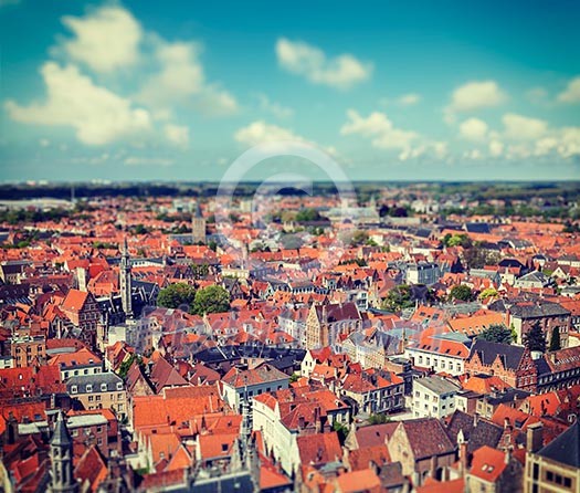 Vintage retro hipster style travel image of aerial view of Bruges (Brugge) from Belfry, Belgium with tilt shift toy effect shallow depth of field Vintage retro hipster style travel image of aerial view of Bruges (Brugge) from Belfry, Belgium with tilt shift toy effect shallow depth of field