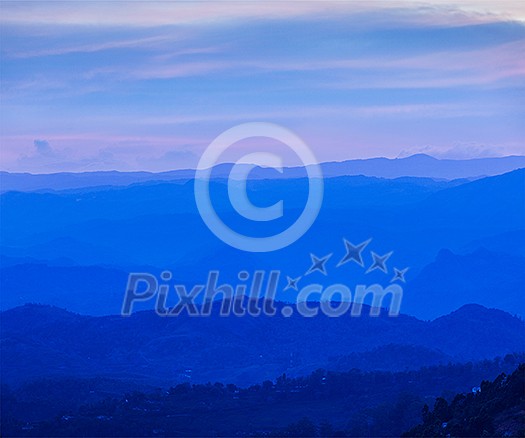 Sunset in mountains in Munnar. Kerala, South India
